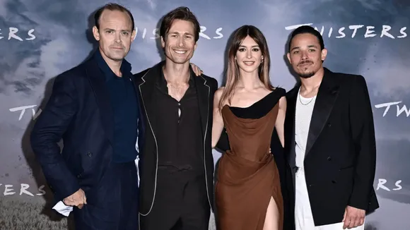 Glen Powell Says David Corenswet Received a Call For 'Superman' While on Twisters' Set