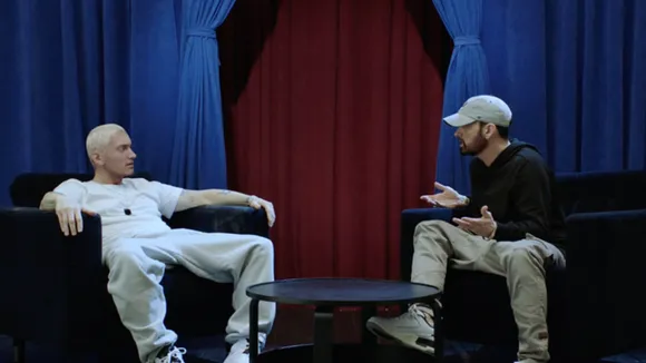 Eminem Claims Machine Gun Kelly Hooked Up With His Mother