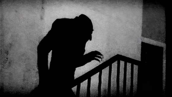 Bill Skarsgård Embraces Darkness in Chilling First Look at 'Nosferatu' Poster