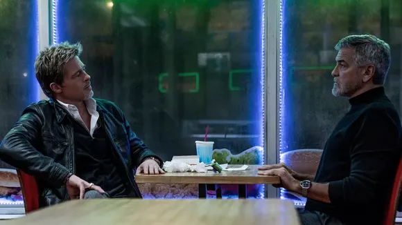 George Clooney And Brad Pitt Grill Amy Ryan in Tense ‘Wolfs’ Clip