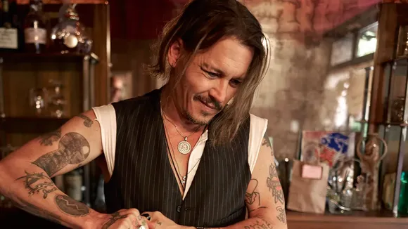 Johnny Depp Enjoys Bartending Experience at a Bahamas Restaurant