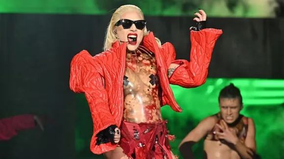 Lady Gaga Struggles to Hand Out Popcorn in High-Fashion at ‘Joker: Folie à Deux’ Screening