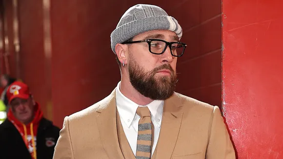 Travis Kelce Rocks Tortured Poets-Chic Look with Thick Glasses and Slim Suit Before AFC Championship