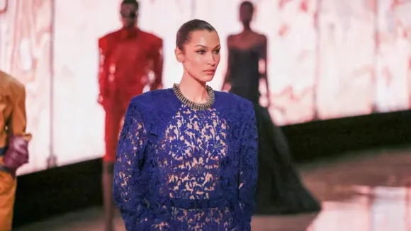 Bella Hadid Stuns in Sheer Lace Dress at Saint Laurent Paris Fashion Week Finale