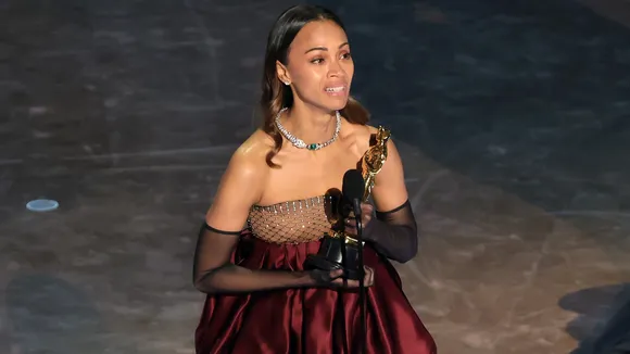 Zoe Saldaña Wins First Oscar, Emotionally Calls for Her Mom
