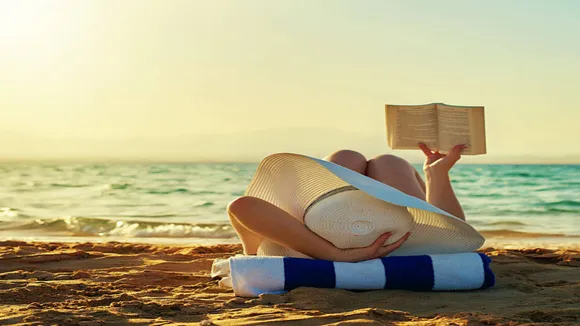 beach photography idea with books 