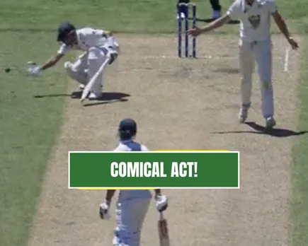 Babar Azam tries to stop the ball