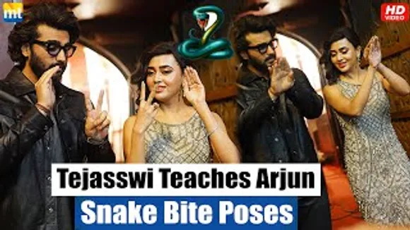 Tejasswi Prakash Teaches SNAKE BITE Pose To Arjun Kapoor On 'Naagin' Sets