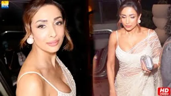 Malaika Arora In A Sexy White Sari Leaves For Dada Saheb Phalke Awards