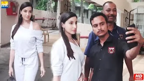 Hot Nora Fatehi Stops While Walking Away And Gives A Pic To A Security Guard