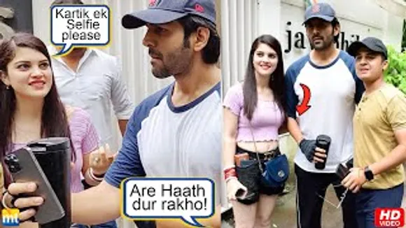 A Female Fan Eagerly waits outside Gym for Shehzada Kartik Aaryan to come and take a Selfie