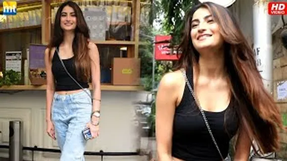 Palak Tiwari in a super cute black crop top paired with straight denims at cafe