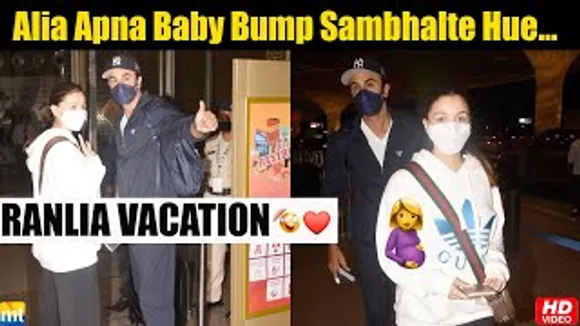 Alia Bhatt at Mumbai airport handling BABY BUMP with hubby Ranbir Kapoor