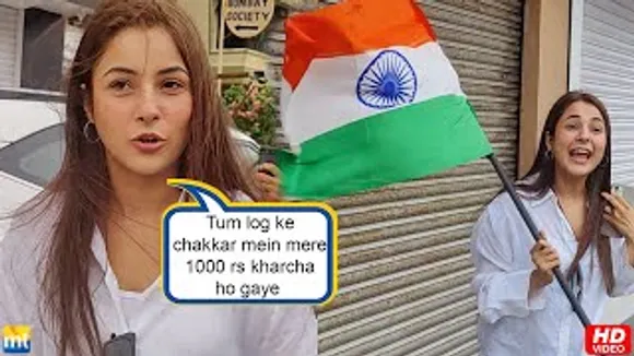 Salman Khan's KEKD Actress Shehnaaz Gill holds Flag at Salon On 75th Independence Day