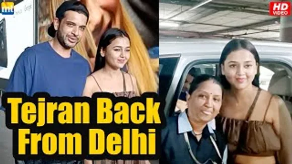 Tejasswi Prakash & Karan Kundrra at Airport, Tejasswi steps out of car, takes pics with Workers