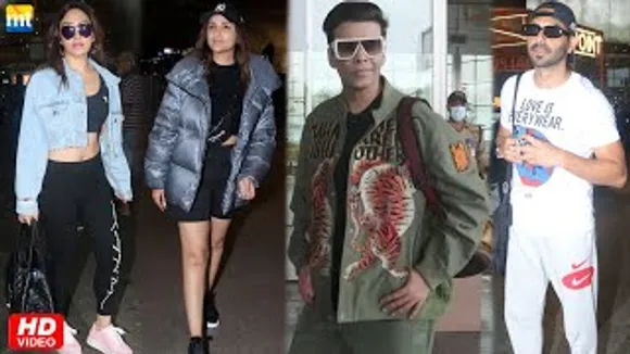 Parineeti Chopra in Black, Khushalii Kumar, Karan Johar And Aparshakti Khurana at airport