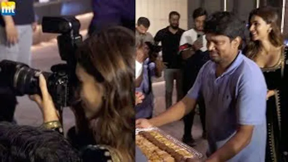 Kriti Sanon Clicks Pic with paps camera distributes Sweets to media on her Diwali party