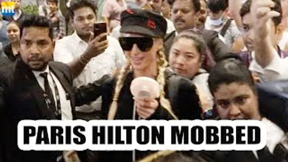 Hollywood Actress Paris Hilton MOBBED at Mumbai Airport as she arrived in India For Ruby Rush Launch
