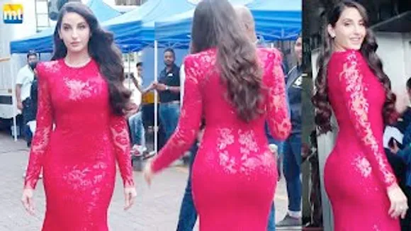 Spicy Nora Fatehi in a body-hugging red gown at Jhalak Dikhhla Jaa 10 sets