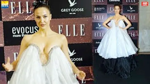 Elli AvrRam dons SUPER BOLD outfit in a white deep neck gown at 'Elle India Beauty Awards 2022'