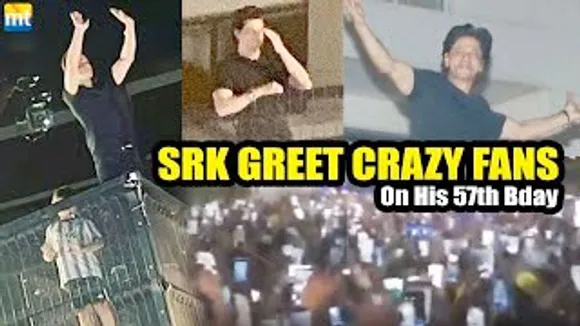 Shah Rukh Khan waves hands to fans who wait outside Mannat on his 57th Birthday