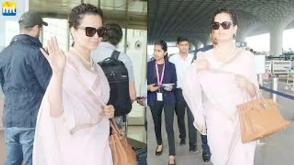Kangana Ranaut makes a stylish appearance at the airport in a saree donning sunglasses