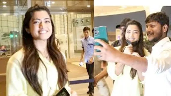 Rashmika Mandanna cutely gives Selfie to Fans at airport while leaving for New year eve