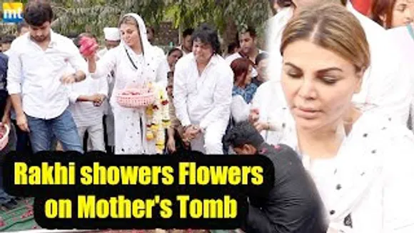 Rakhi Sawant showers Flowers on her Mother's Tomb, Prays For Her Soul to be Rest in Peace