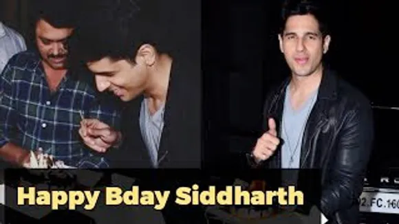 Birthday Boy Sidharth Malhotra cuts cake with Media outside his House