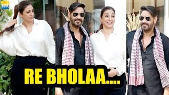 Tabu laughs openly as she poses with Ajay Devgn in Desi Bholaa Look