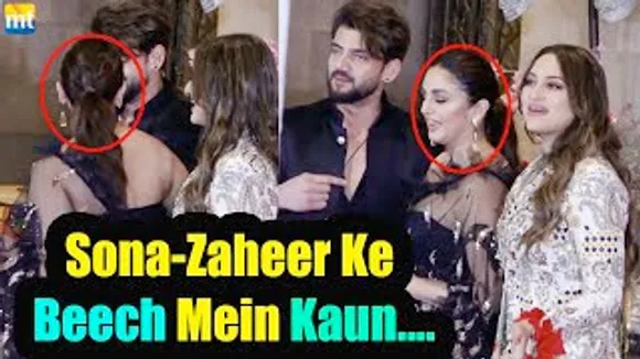 Huma Qureshi comes BETWEEN Sonakshi & Rumoured BF Zaheer Iqbal at Raveena Taurani's Reception