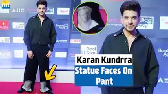 Karan Kundrra gets Brutally TROLLED for wearing Pants with STATUE Faces at the Bottom