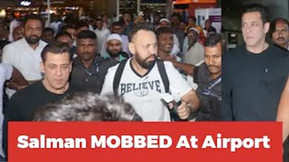 Salman Khan with a Chain of GUNMEN is MOBBED by fans as he returns from Dubai