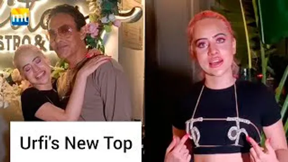 Urfi Javed Wears 'BAD WORD' Short Top With Director Mozez Singh At Restaurant