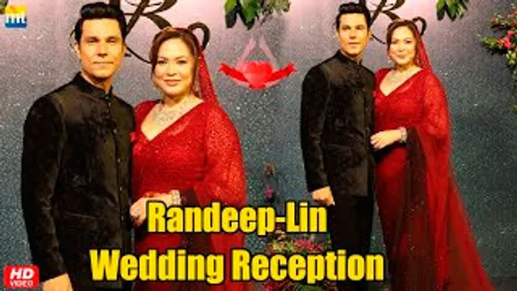 Perfect Couple Randeep Hooda & Lin Laishram Arrive In Style At Their Wedding Reception