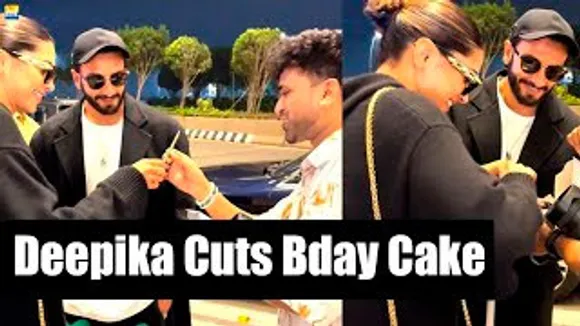 Deepika Padukone Cuts Birthday Cake With A Pap At Airport; Ranveer Singh Watches