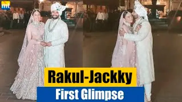 Jackky Bhagnani Gives A Kiss To Wife Rakul Preet Singh As They Pose After The Wedding