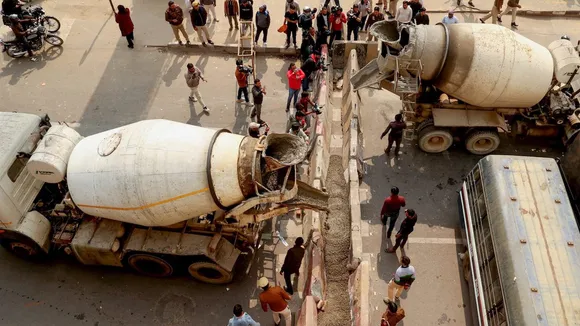 Barricades being put up at Ghazipur border in view of farmers' 'Delhi Chalo March', in New Delhi, Monday, Feb. 12, 2024.