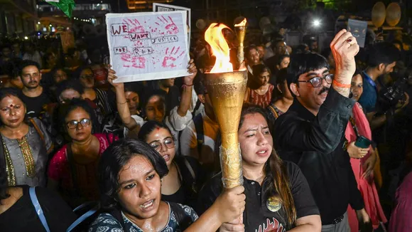 Members of Citizen Forum participate in torch rally against the alleged rape and murder of trainee doctor, in Kolkata, Friday, Sept. 20, 2024.