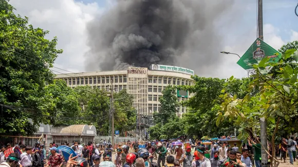 Black smoke rises from the Bangabandhu Sheikh Mujib Medical University (BSMMU) during clashes between protesters and Awami League members, on the first day of the non-cooperation movement at Dhaka University campus in Dhaka, Bangladesh, 04 August 2024.