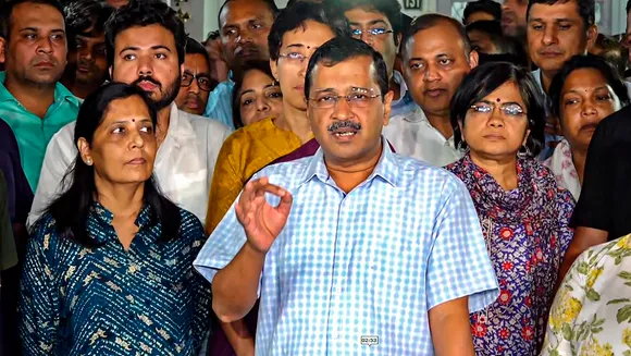Arvind Kejriwal interacts with the media after meeting with the family of AAP leader Sanjay Singh over the latter’s arrest by the Enforcement Directorate (ED) in connection with alleged corruption in the 2021-22 Delhi Excise policy, in New Delhi, Wednesday, Oct. 4, 2023. 