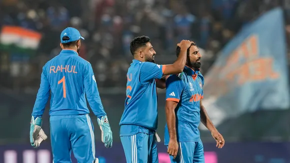 Indian bowler Mohammed Shami with teammates celebrates the wicket of New Zealand's Daryl Mitchell during the ICC Men's World Cup ODI cricket match between India and New Zealand at HPCA Stadium, Dharamshala, Sunday, Oct. 22, 2023.