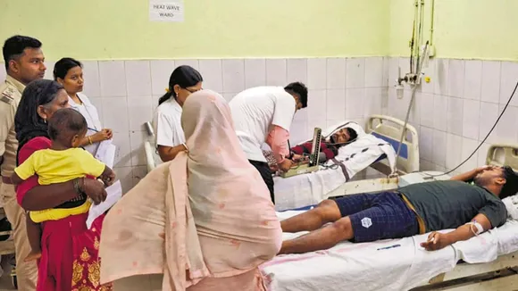 People being treated after the consumption of suspected spurious liquor, in Saran