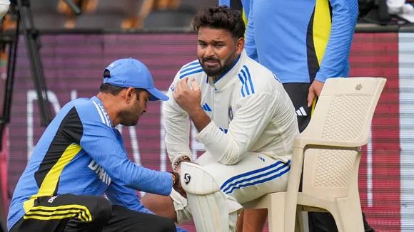 Rishabh Pant reacts after being taken off field following an injury on the second day of the first test cricket match between India and New Zealand, at the M Chinnaswamy Stadium, in Bengaluru, Thursday, Oct. 17, 2024.