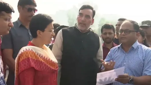 CM Atishi and Environment Minister Gopal Rai inspect Anand Vihar hotspot. 