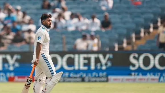 Rishabh Pant returns to the pavilion after being dismissed by New Zealand's Glenn Phillips on the second day of the second test cricket match, in Pune, Friday, Oct. 25, 2024.