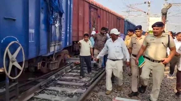 Police and other officials at the site where a goods train derailed near Saharanpur, on Friday, Oct. 25, 2024.