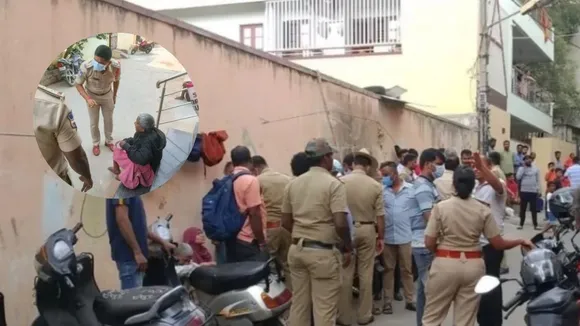 Telangana police and people outside the house of a visually challenged elderly couple who were found living with the body of their 30-year-old son on Tuesday
