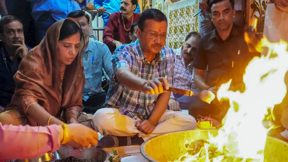 AAP National Convenor Arvind Kejriwal along with his wife Sunita Kejriwal performs 'Yagya', at Hanuman Temple in New Delhi.