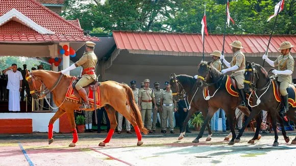 Kerala Chief Minister Pinarayi Vijayan takes the salute during the Passing Out Parade on the occasion of Kerala Formation Day, in Thiruvananthapuram, Friday, Nov 1, 2024.